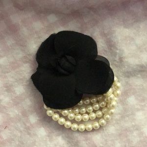 Pearl and black flower bracelet